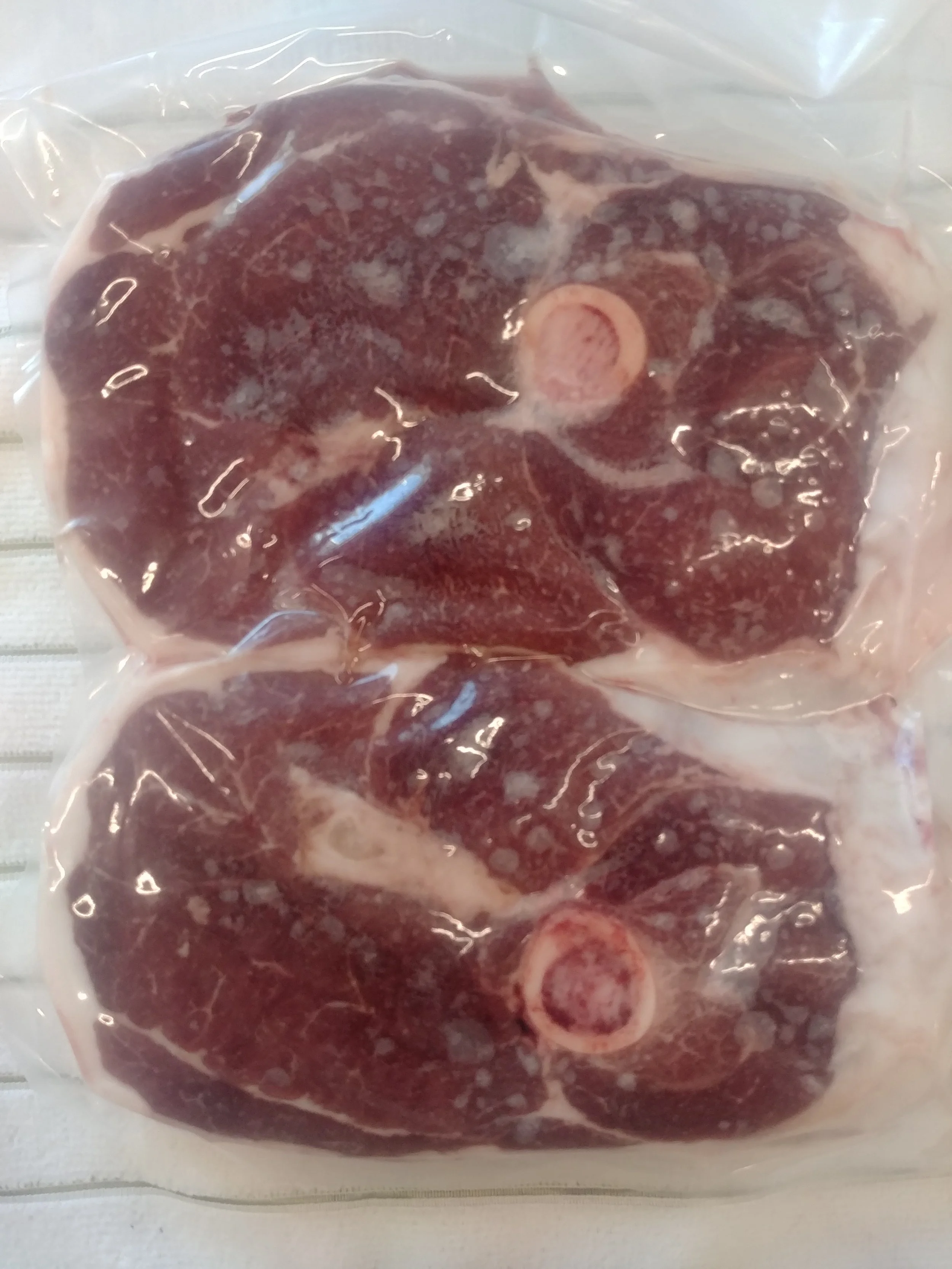 Packaged, frozen bone-in lamb cuts from Friesz Family Farm